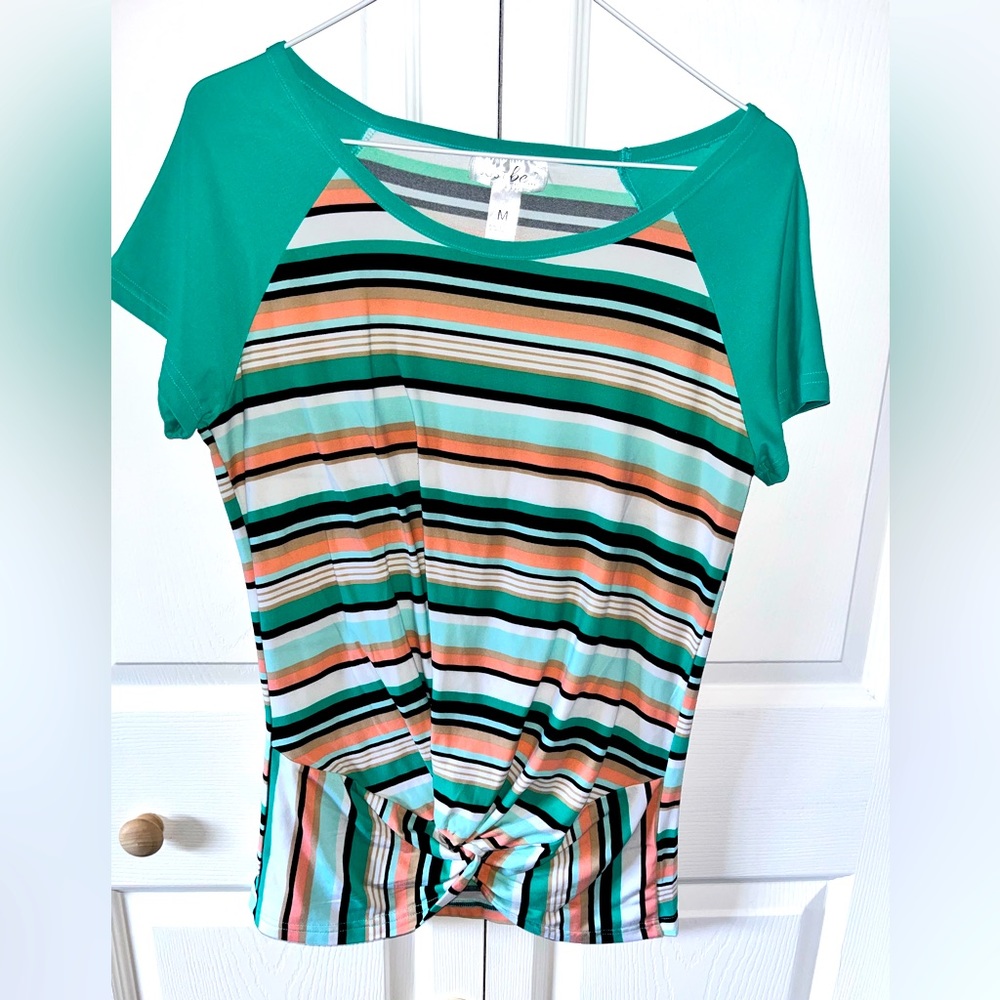 Just Be shirt medium in great used condition. It has multiple color patterns.